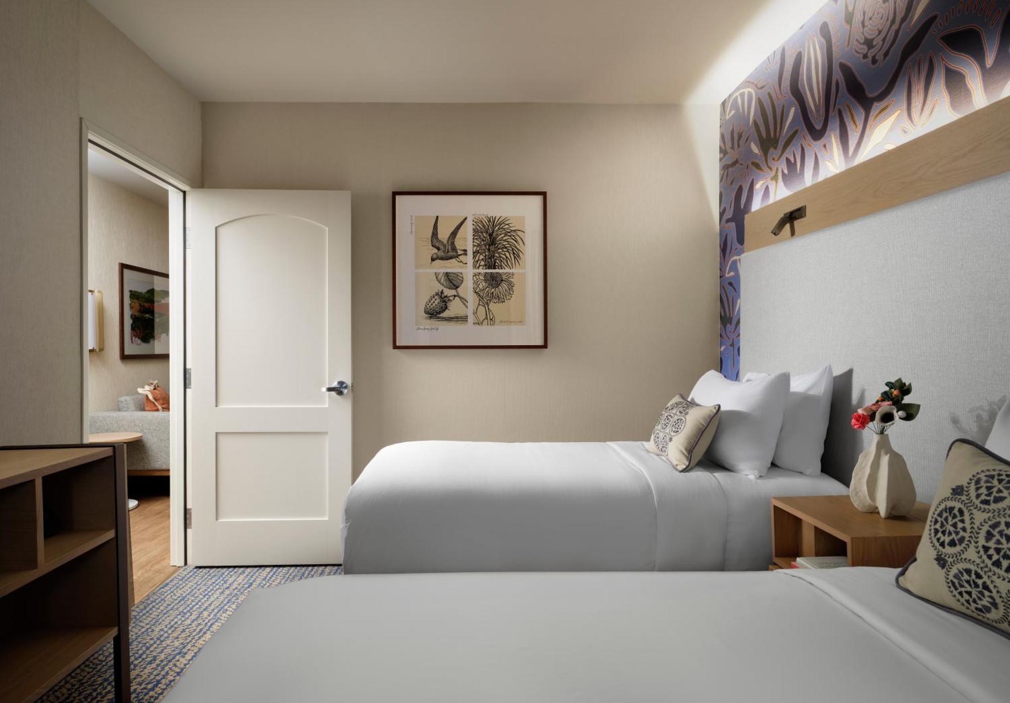 One-Bedroom Family Suite with One King Bed and Two Single Beds,1758343656:JPEG